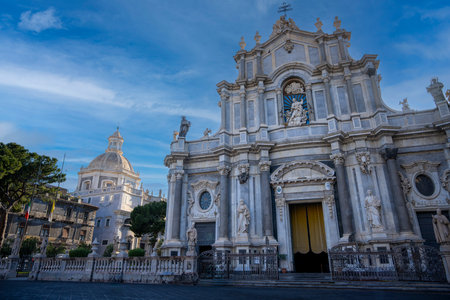 Beautiful Italian church stands tall, surrounded by vibrant city life.の写真素材