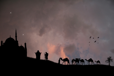 Arabian sunset with bedouins and camelsのイラスト素材
