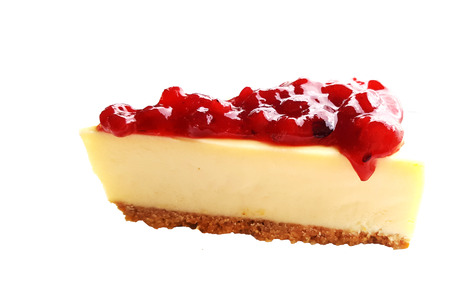 Chesse pie with cranberry sauce on white backgroundの写真素材