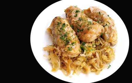 Stuffed cabbage rolls with rice and meat on black backgroundの写真素材
