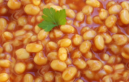 Baked beans in tomato sauce backgroundの写真素材