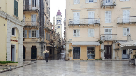 CORFU, GREECE - JANUARY 21, 2018: Streets and the bell tower of the church of Saint Spyridon in Corfu town, Greeceのeditorial素材