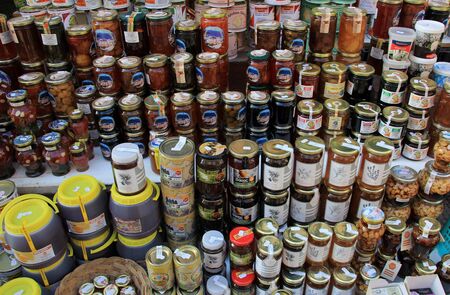 THASSOS, GREECE- September 11, 2015: Traditional greek products for sale in a street shop in Limenas, Thasos island, Greeceのeditorial素材