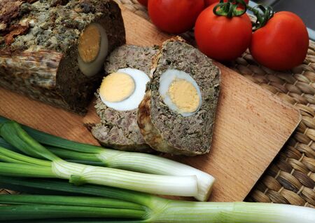 Baked meatloaf with boiled eggs (Easter recipe)の写真素材