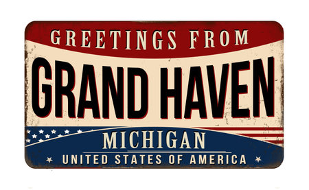 Greetings from Grand Haven vintage rusty metal sign on a white background, vector illustrationのイラスト素材