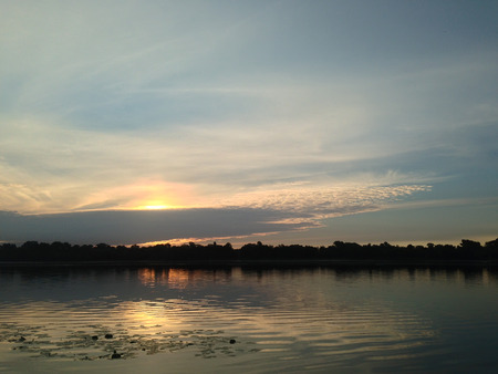 the blue summer sunrise on the riverの写真素材