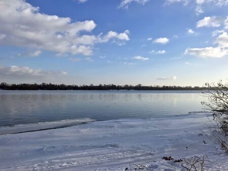 the snowy morning in the sun in the winterの写真素材