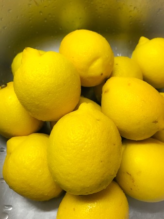 yellow lemons set the mood in winterの写真素材