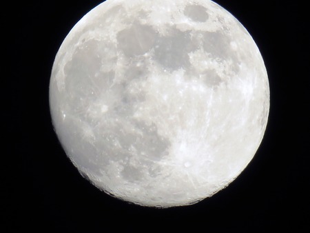 big moon in the night sky without cloudsの写真素材