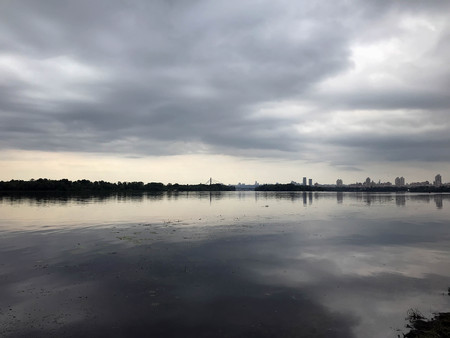Cloudy morning on the river in early summerの写真素材