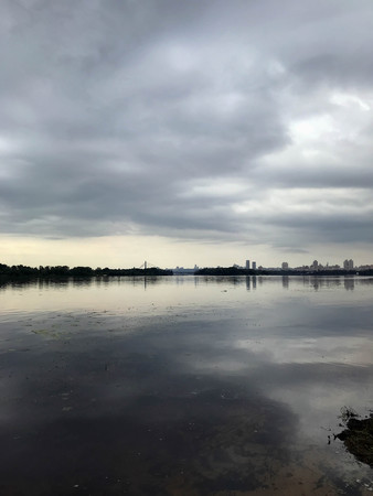 Cloudy morning on the river in early summerの写真素材