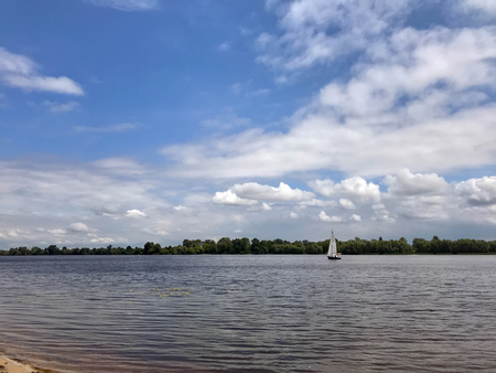 Cloudy morning on the river in early summerの写真素材
