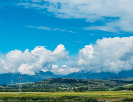 wheat field and blue mountainsの写真素材