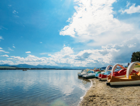summer Lake and mountains on a sunny dayの写真素材