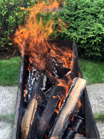 the firewood for barbecue burn in barbecueの写真素材