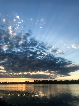 The beautiful summer dawn on the riverの写真素材