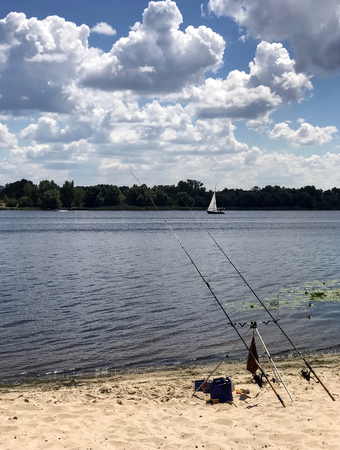 The summer fishing on the river in the beachの写真素材