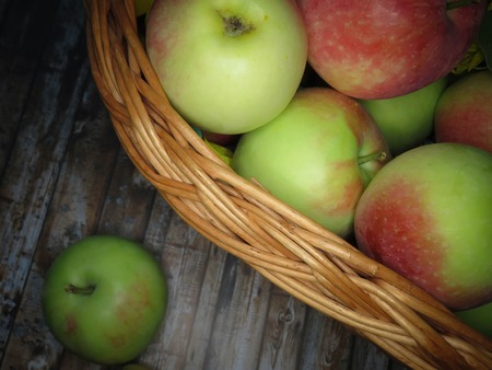 ripe apples in a basket. healthy eating. eco-friendly products. organic fruits. Organic Food. Style Top View Group Objectsの写真素材
