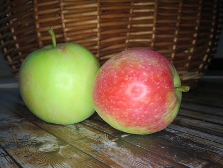 ripe apples in a basket. healthy eating. eco-friendly products. organic fruits. Organic Food. Style Top View Group Objectsの写真素材
