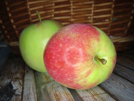 ripe apples in a basket. healthy eating. eco-friendly products. organic fruits. Organic Food. Style Top View Group Objectsの写真素材