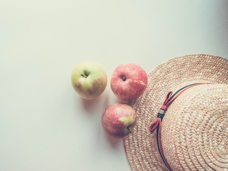 ripe apples and hat. healthy eating. eco-friendly products. organic fruits. copy space. Organic Food. Style Top View Group Objects Flatlayの写真素材