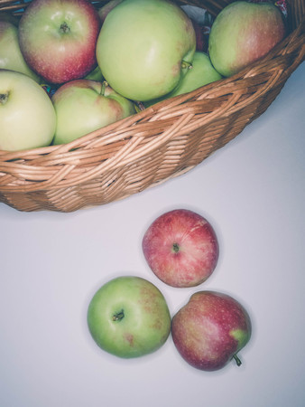 ripe apples in a basket. healthy eating. eco-friendly products. organic fruits. Organic Food. Style Top View Group Objectsの写真素材