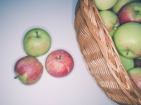 ripe apples in a basket. healthy eating. eco-friendly products. organic fruits. Organic Food. Style Top View Group Objectsの写真素材