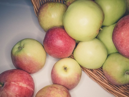 ripe apples in a basket. healthy eating. eco-friendly products. organic fruits. Organic Food. Style Top View Group Objectsの写真素材