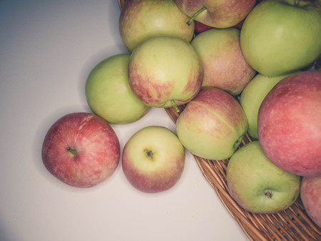 ripe apples in a basket. healthy eating. eco-friendly products. organic fruits. Organic Food. Style Top View Group Objectsの写真素材