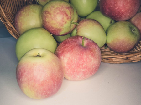 ripe apples in a basket. healthy eating. eco-friendly products. organic fruits. Organic Food. Style Top View Group Objectsの写真素材