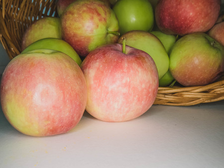 ripe apples in a basket. healthy eating. eco-friendly products. organic fruits. Organic Food. Style Top View Group Objectsの写真素材