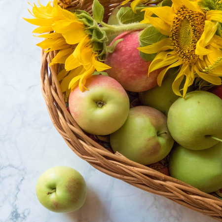 ripe apples in a basket. healthy eating. eco-friendly products. organic fruits. Organic Food. Style Top View Group Objectsの写真素材