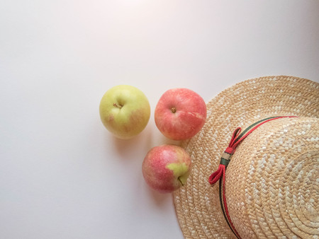 ripe apples and hat. healthy eating. eco-friendly products. organic fruits. copy space. Organic Food. Style Top View Group Objects Flatlayの写真素材