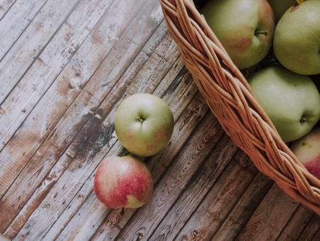 ripe apples in a basket. healthy eating. eco-friendly products. organic fruits. copyspace. Organic Food. Style Top View Group Objectsの写真素材