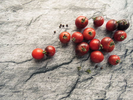 red tomatoes on a wooden board. healthy eating. eco-friendly products. Organic Food. Style Top View Group Objectsの写真素材
