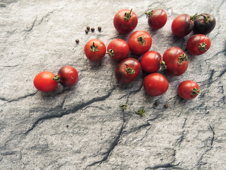 red tomatoes on a wooden board. healthy eating. eco-friendly products. Organic Food. Style Top View Group Objectsの写真素材