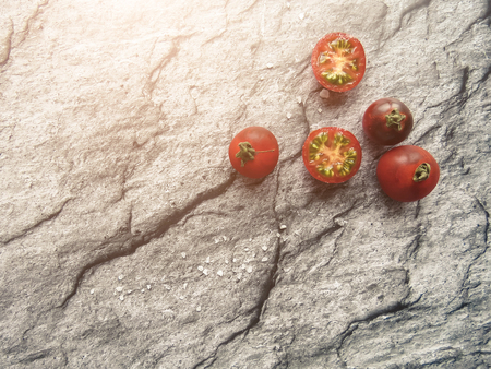 red tomatoes on a wooden board. healthy eating. eco-friendly products. Organic Food. Style Top View Group Objectsの写真素材