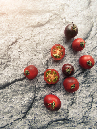 red tomatoes on a wooden board. healthy eating. eco-friendly products. Organic Food. Style Top View Group Objectsの写真素材