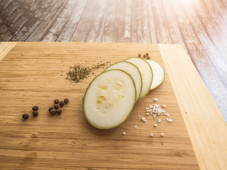 zucchini sliced on a wooden board. healthy eating. eco-friendly products. Organic Food. Style Top View Group Objectsの写真素材