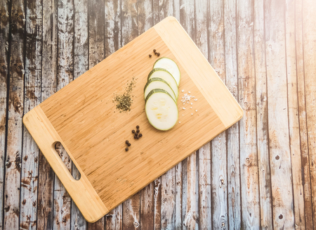 zucchini sliced on a wooden board. healthy eating. eco-friendly products. Organic Food. Style Top View Group Objectsの写真素材