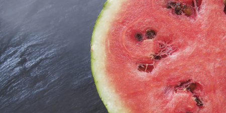 ripe red watermelon on a dark background Summer food background healthy eating. eco-friendly products. organic fruits. copyspace. Organic Food. Style Top Viewの写真素材