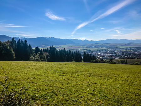 Mountains with snowy peaks in the sunlight in the fall. High Tatras Slovakia. The concept of ecological and active tourism. Autumn in nature.の写真素材