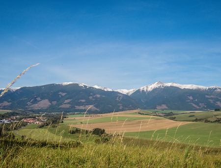 Mountains with snowy peaks in the sunlight in the fall. High Tatras Slovakia. The concept of ecological and active tourism. Autumn in nature. Octoberの写真素材