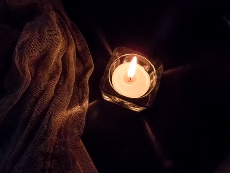 Dark color luxury background. Candles on black table top view. Premium horizontal design. candle...