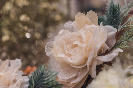 Christmas tree with beautiful shiny flowers and butterflies. Winter holidays concept.の写真素材