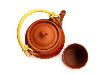 Clay teapot and cup for the Chinese tea isolated on a white backgroundの写真素材
