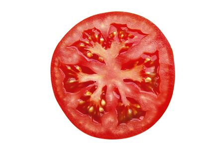 The half of fresh tomato, isolated on the whiteの写真素材