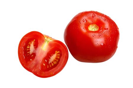 Single and a half of fresh tomato on the whiteの写真素材