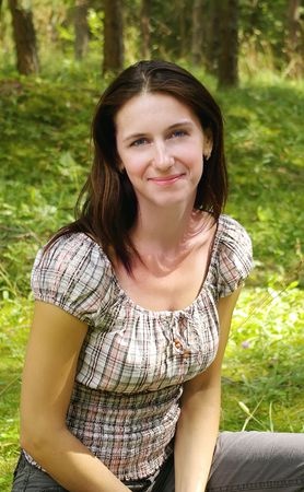 Portrait of a young beautiful women in the forestの写真素材