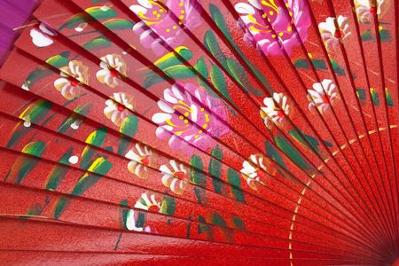 Chinese red wooden fan on the whiteの写真素材